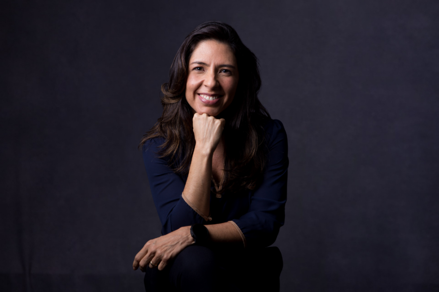 Gabriela Romero, APSV Advogados' new CEO, representing the firm's new phase of management and female leadership.